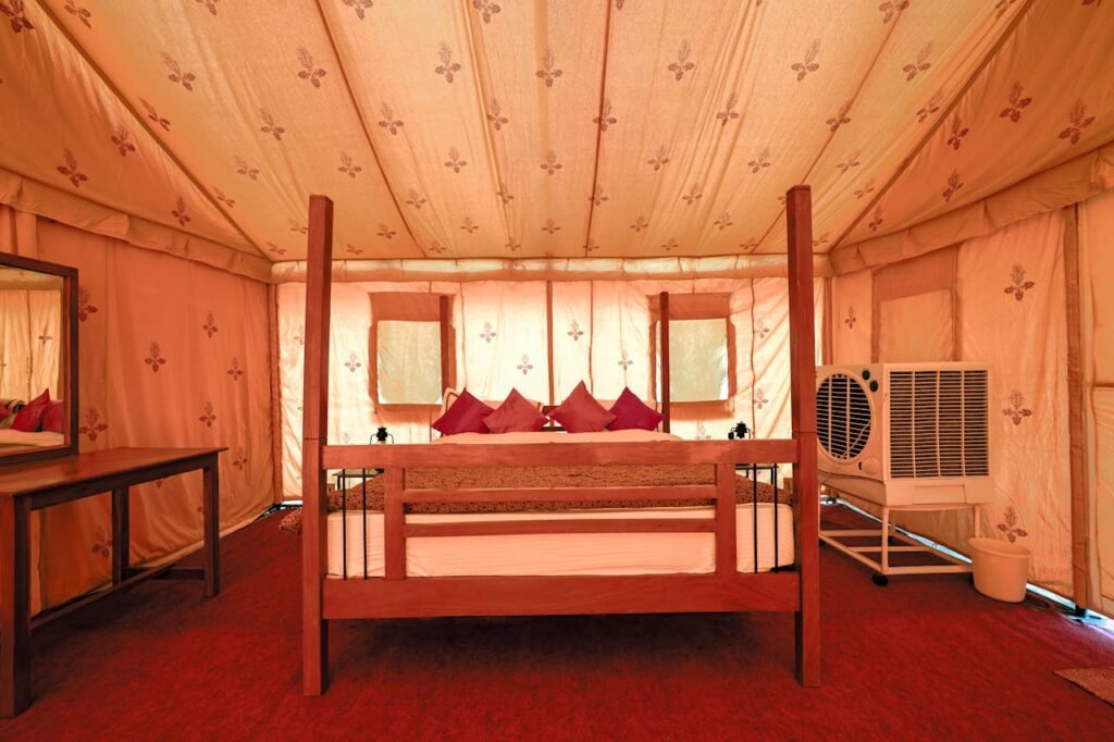 pexels photo 9491326 Cozy glamping tent with a wooden bed and air cooler in Jaisalmer, India